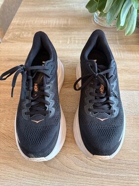 Hoka Women's Black Running Shoes with Light Pink Accents